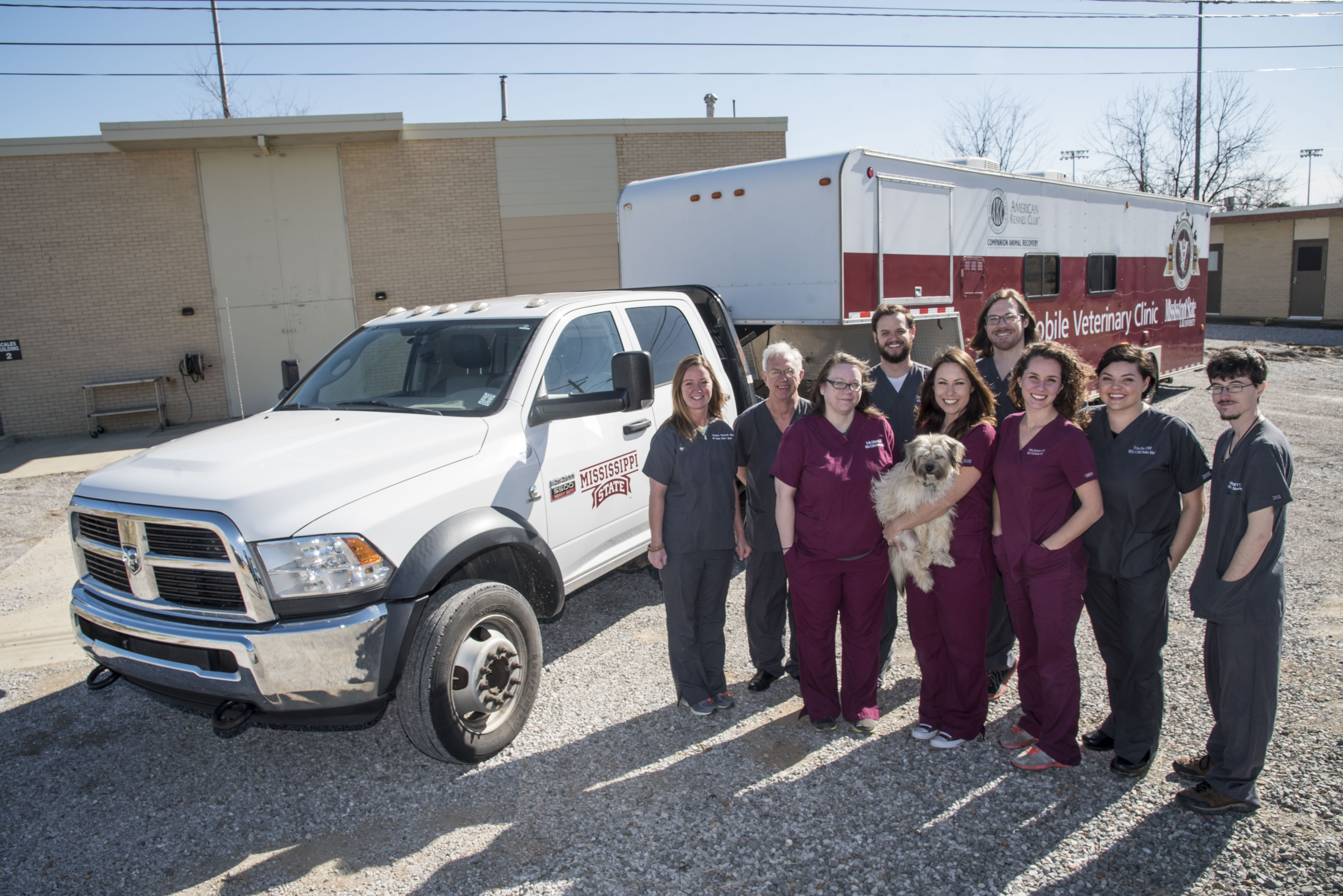 A team poses outside of the shelter medicine mobile unit